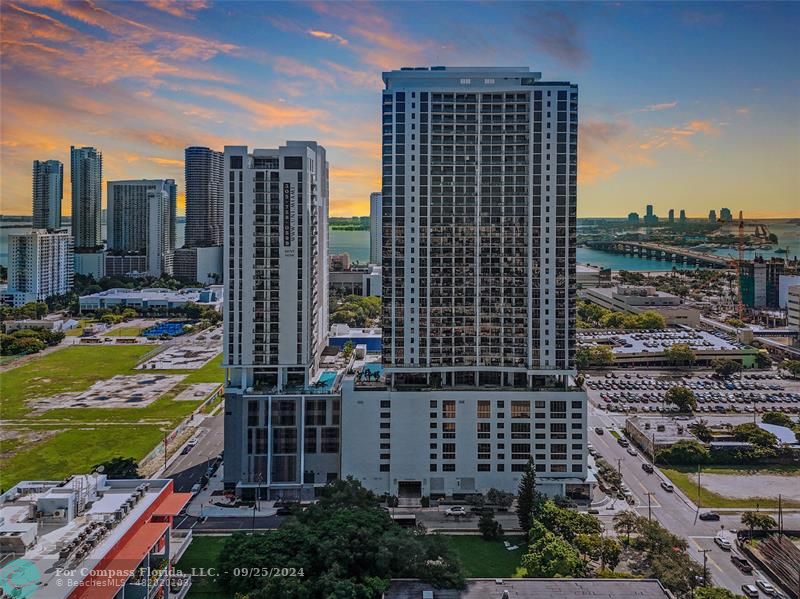 a view of a city with tall buildings