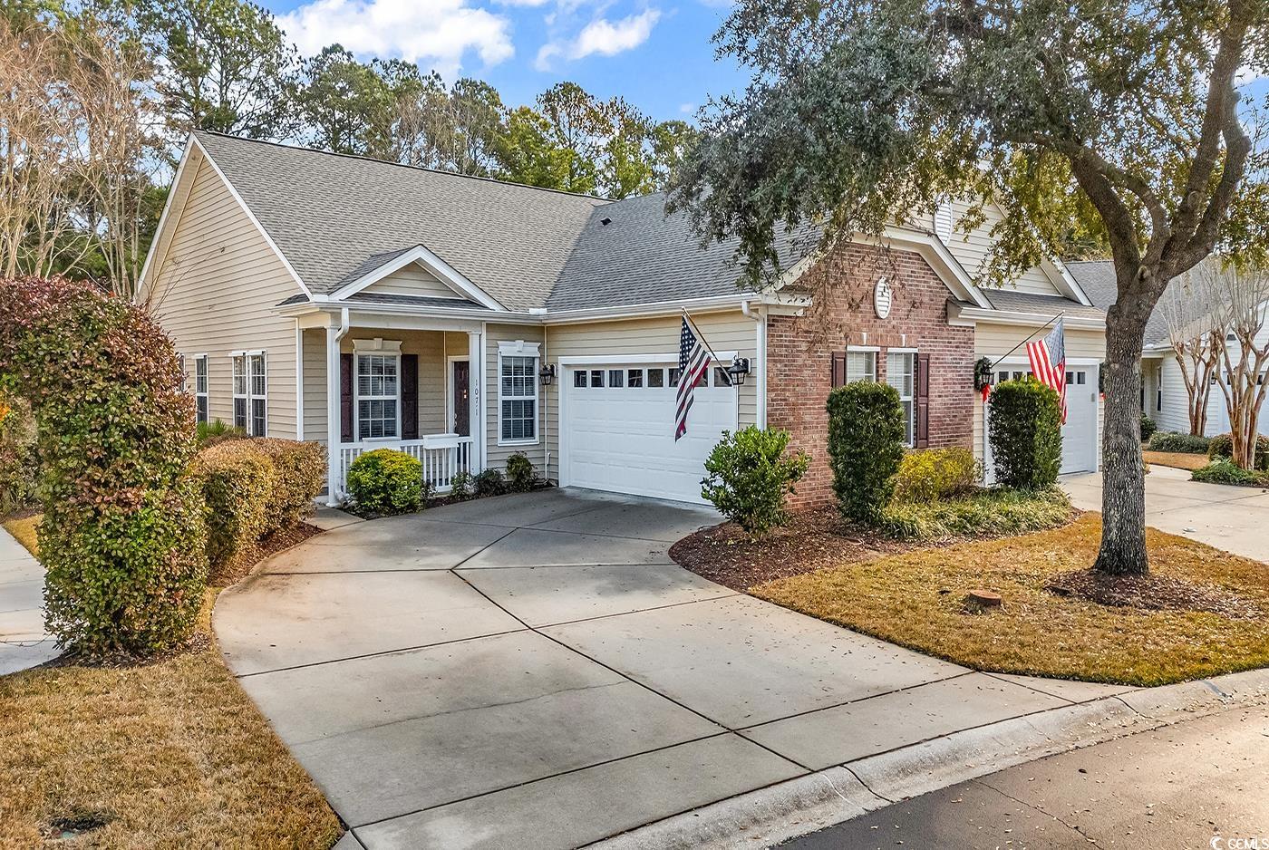 View of front of property featuring a porch and a