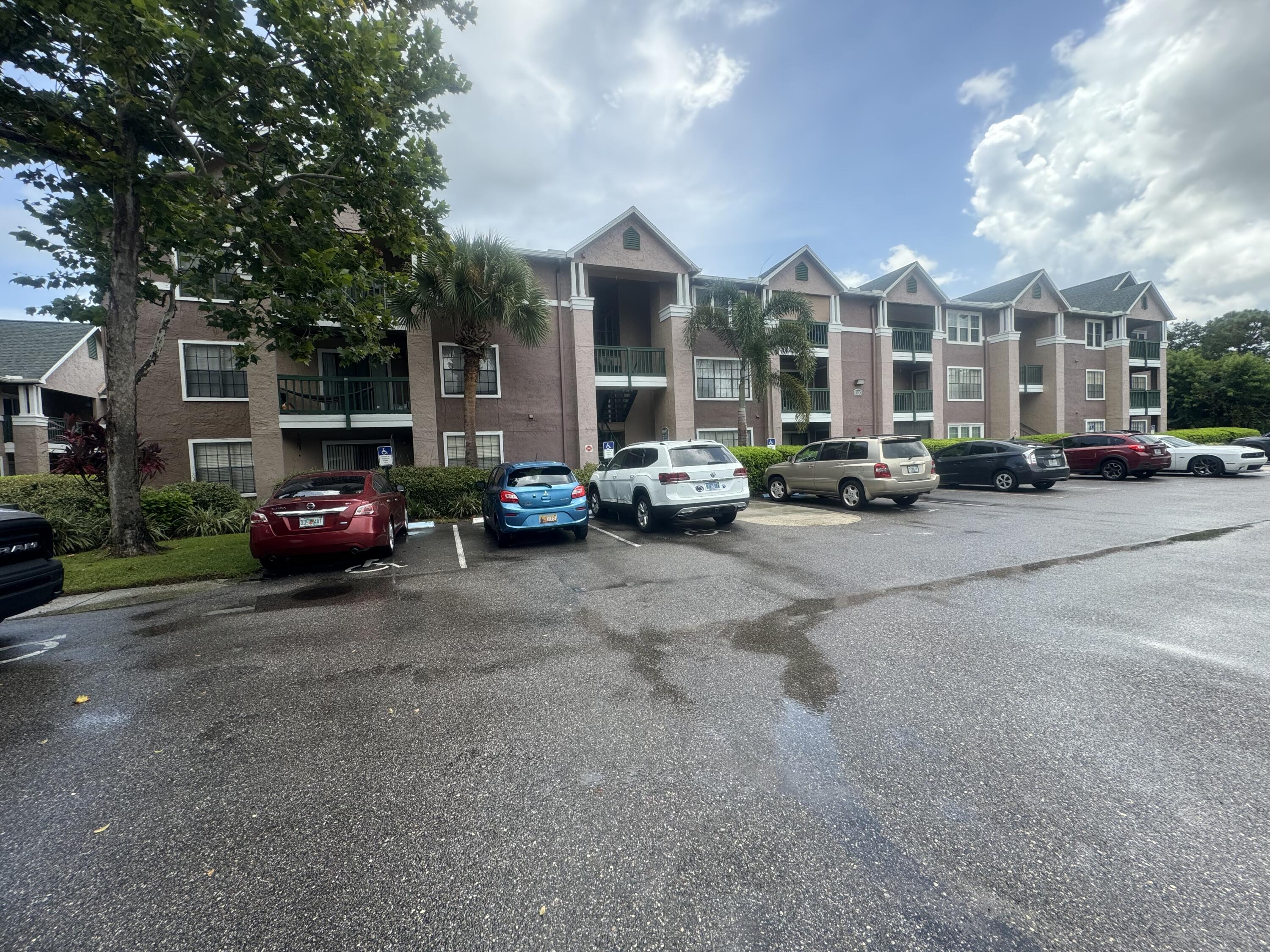 a cars parked in front of a brick building