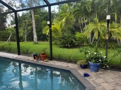 a view of swimming pool from a lake view