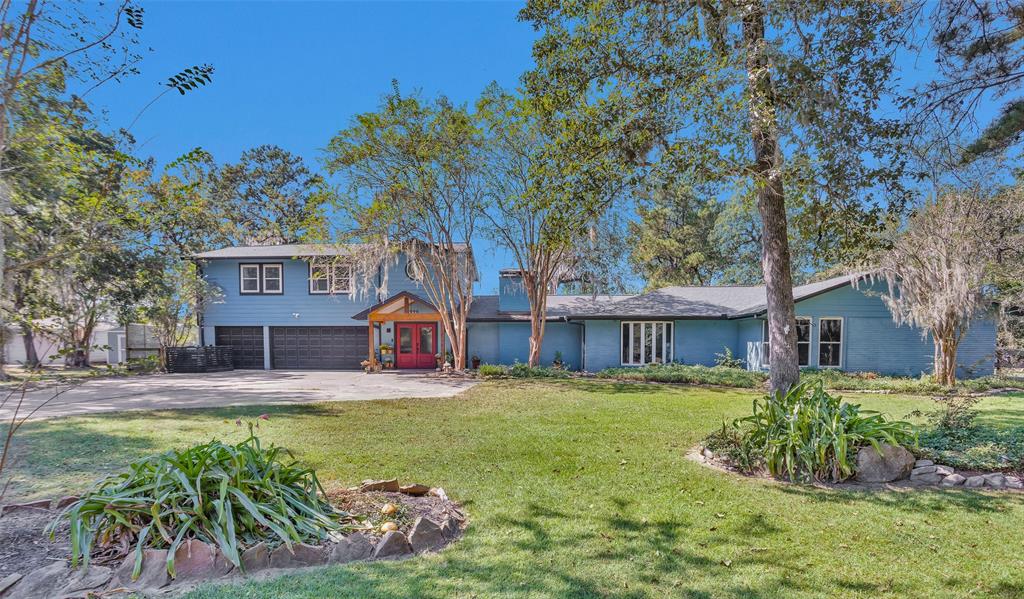 front view of a house with a big yard