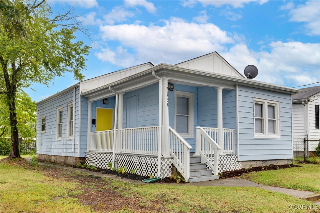 front view of a house with a yard