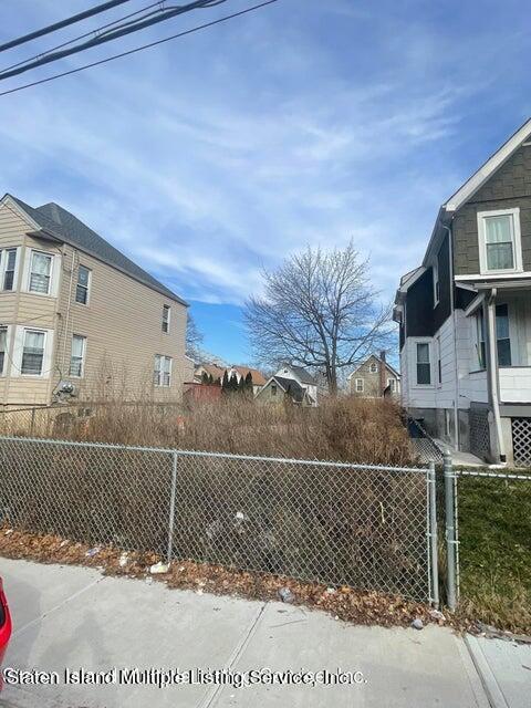 a view of a house with a street