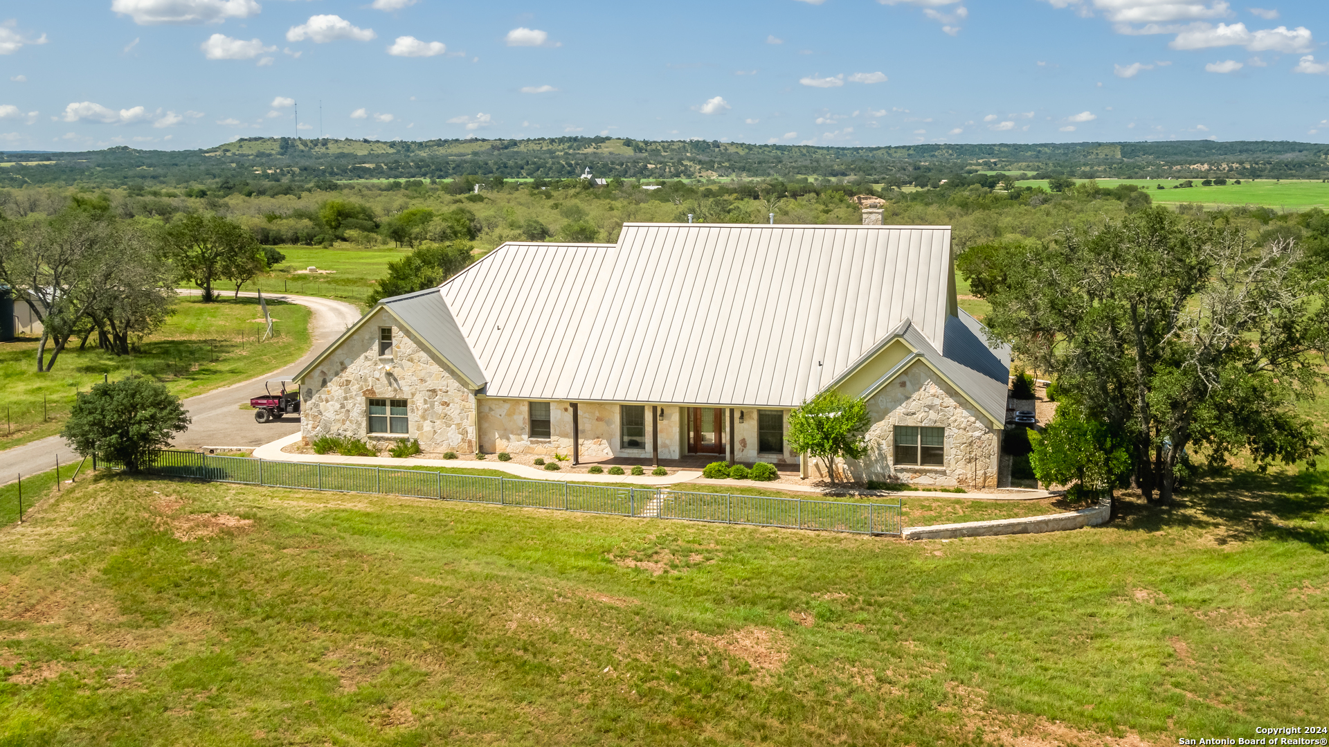 a view of a house with a big yard