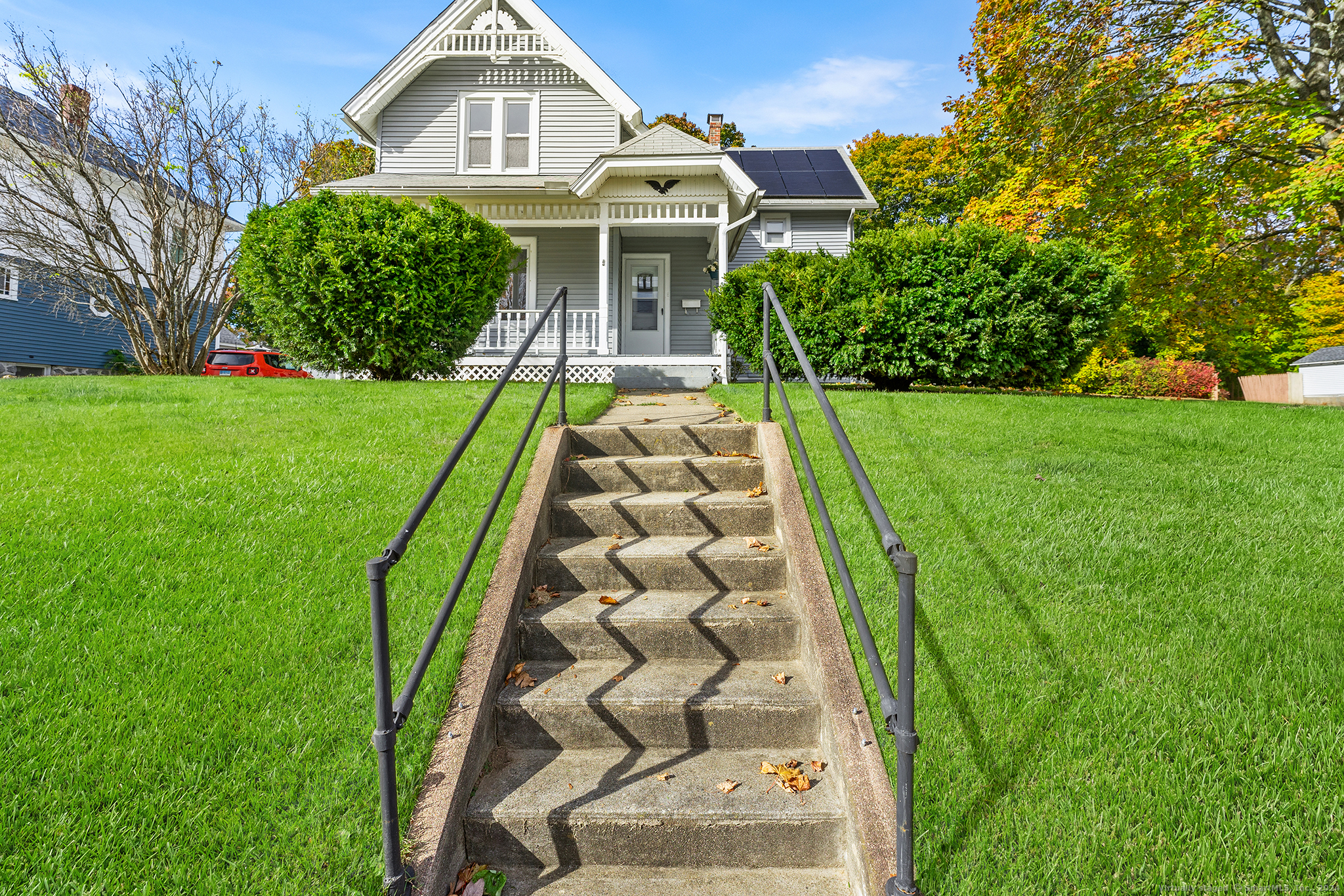 a front view of a house with a yard