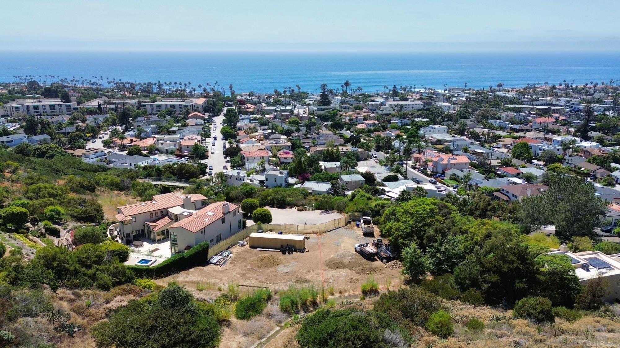 an aerial view of a city with lots of residential buildings