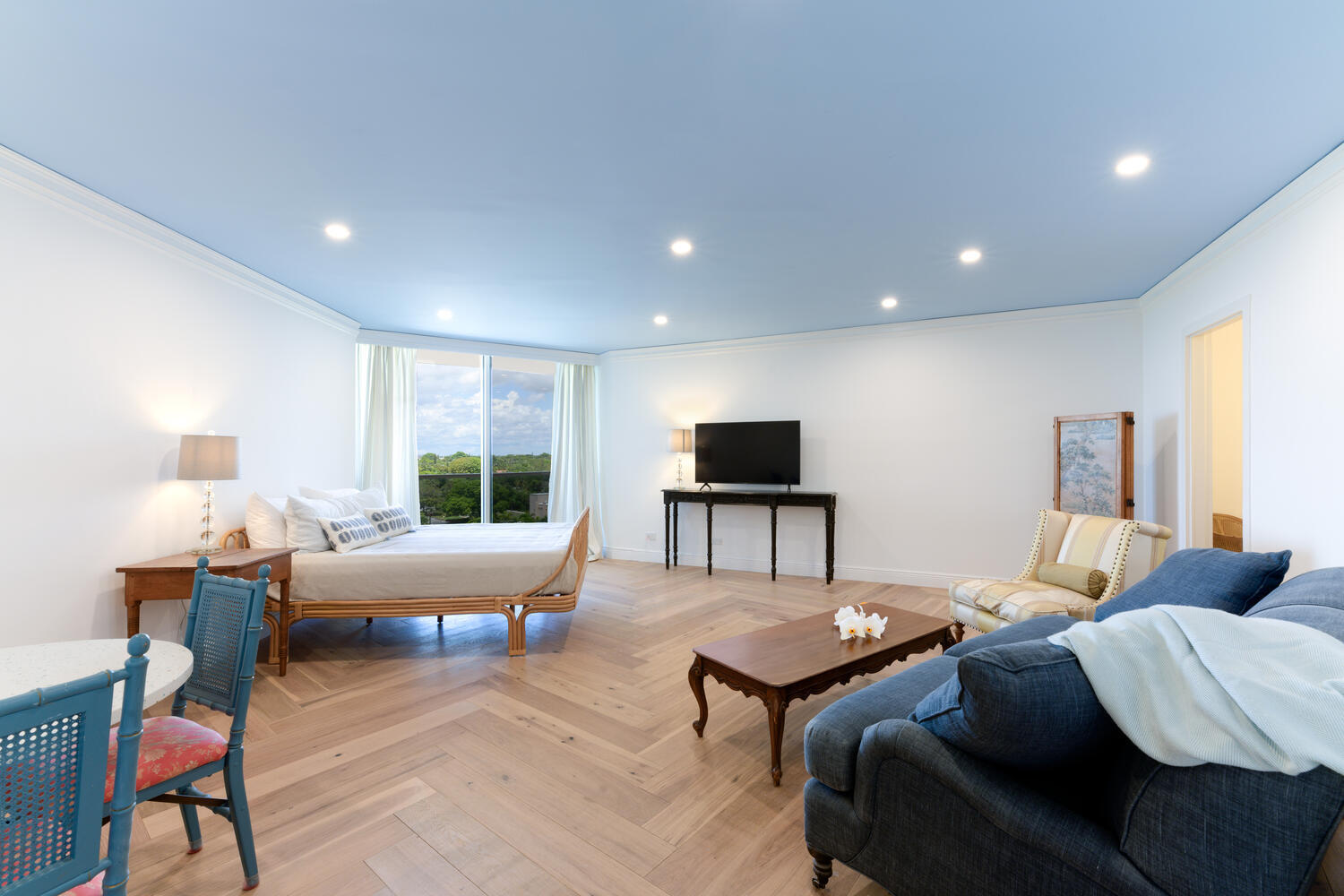 a living room with furniture and a window