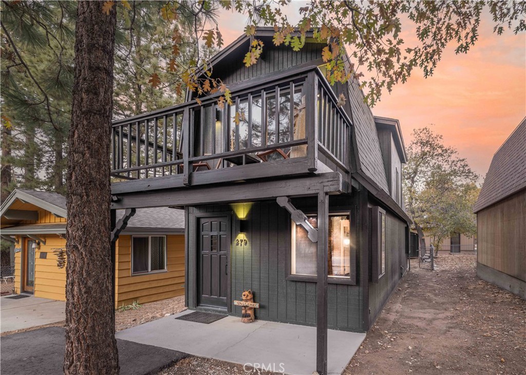 front view of a house with a small yard