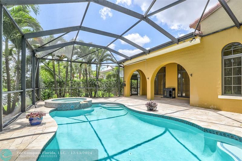 a view of swimming pool with a porch