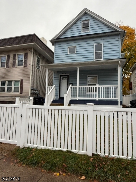 a front view of a house with balcony