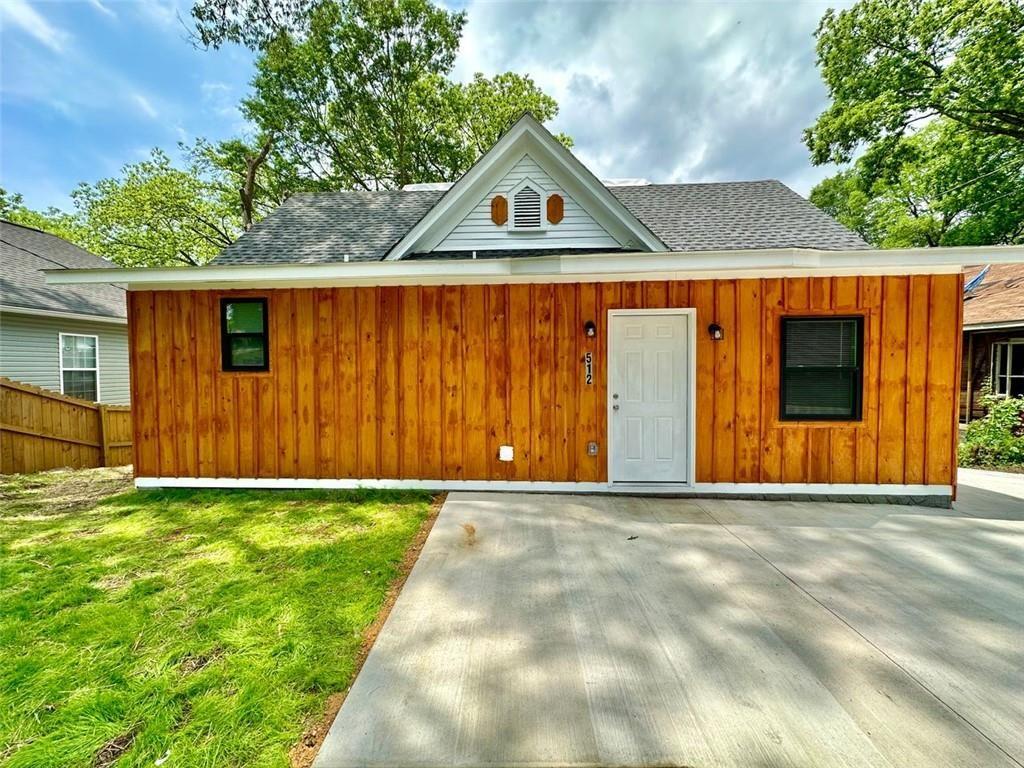 a front view of house with yard