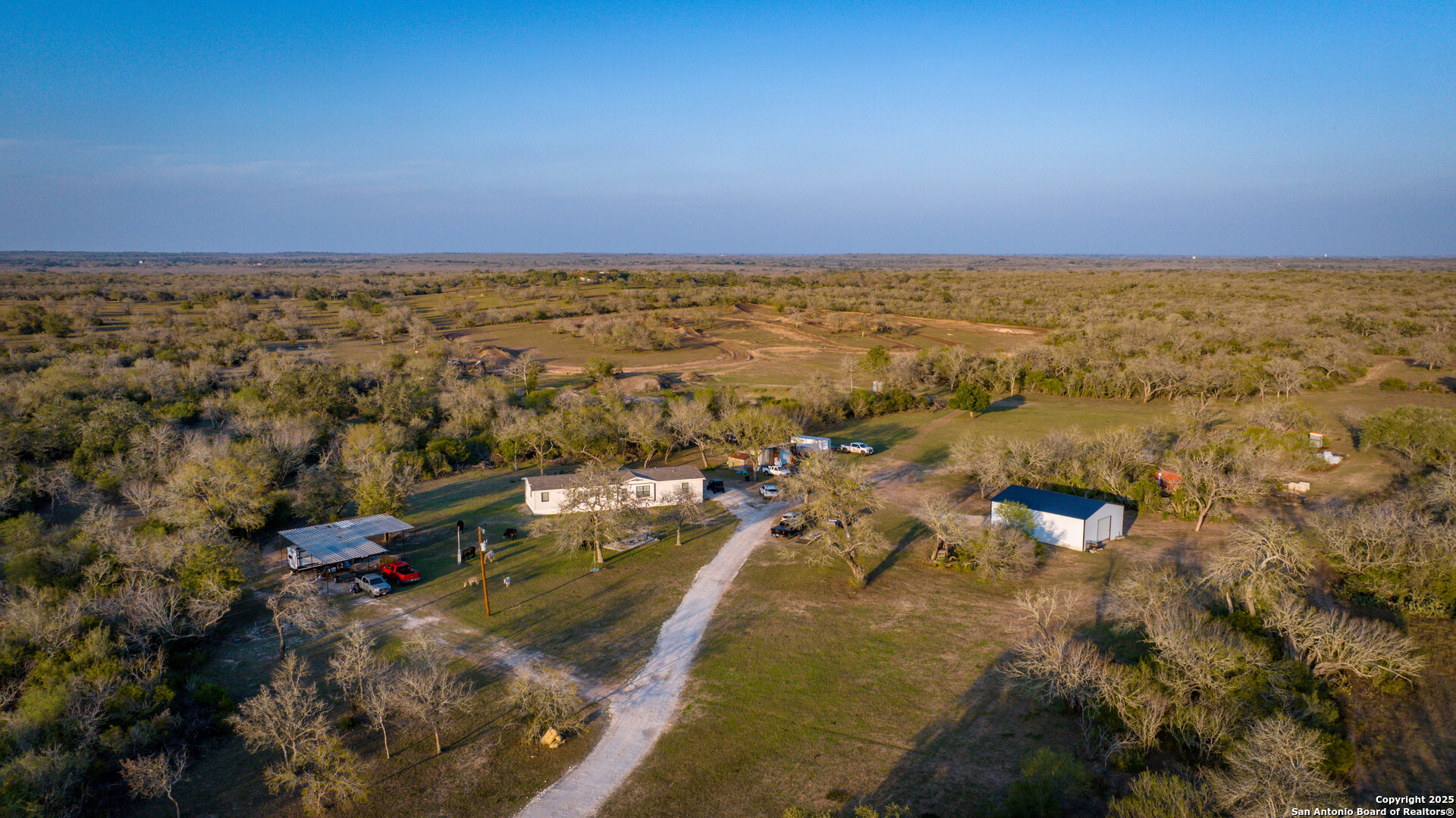 an aerial view of residential building and ocean