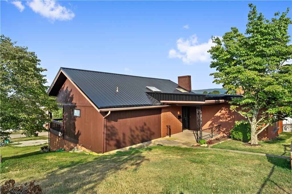 a backyard of a house with yard and garage