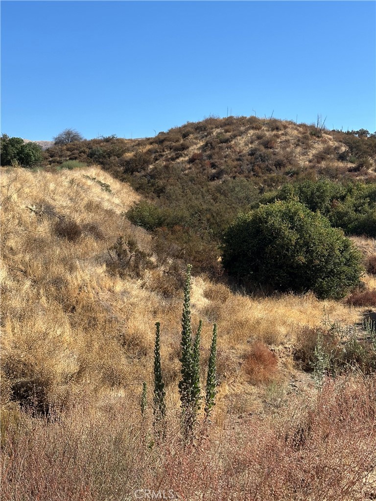 a view of mountain view with mountains in the background