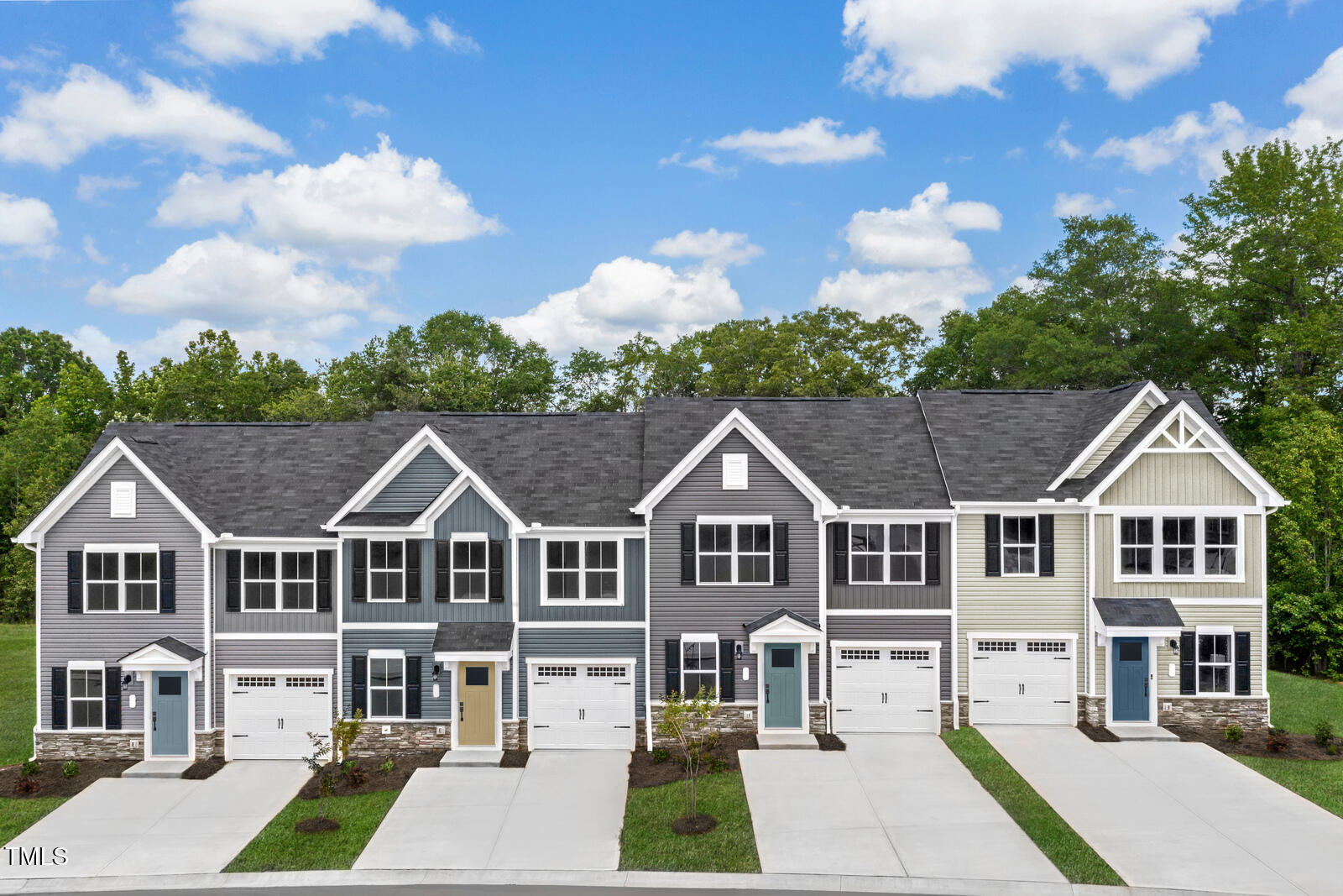 a view of multiple houses with a yard