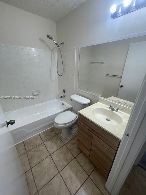 a bathroom with a sink mirror toilet and bathtub