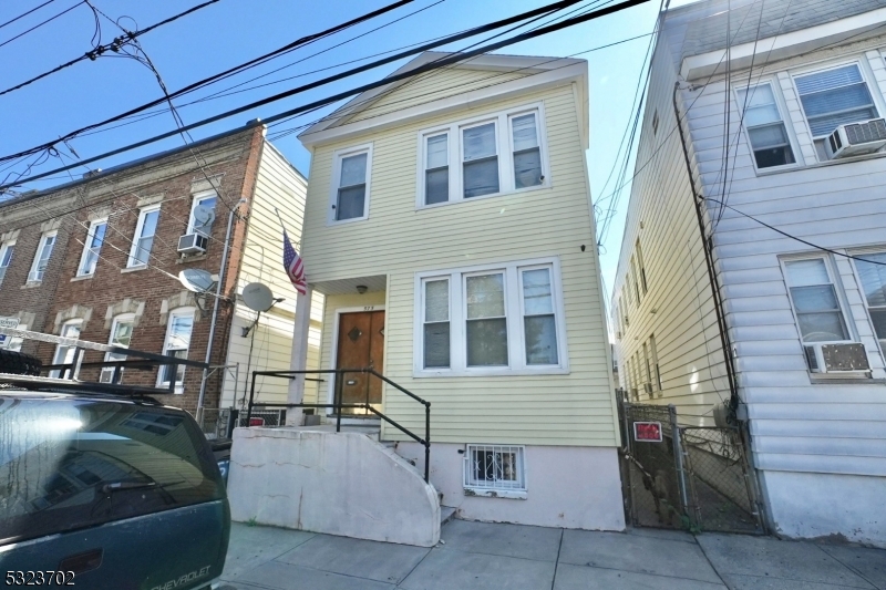 a view of a brick building with many windows