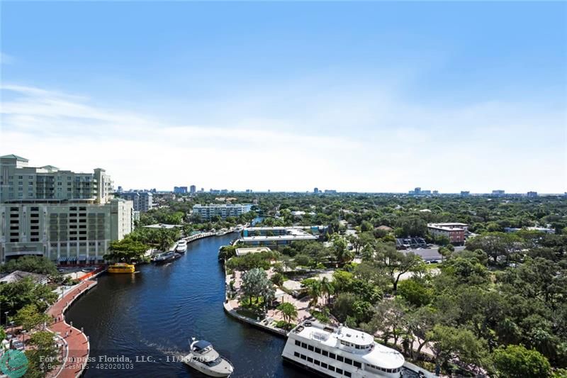 a view of a lake with city