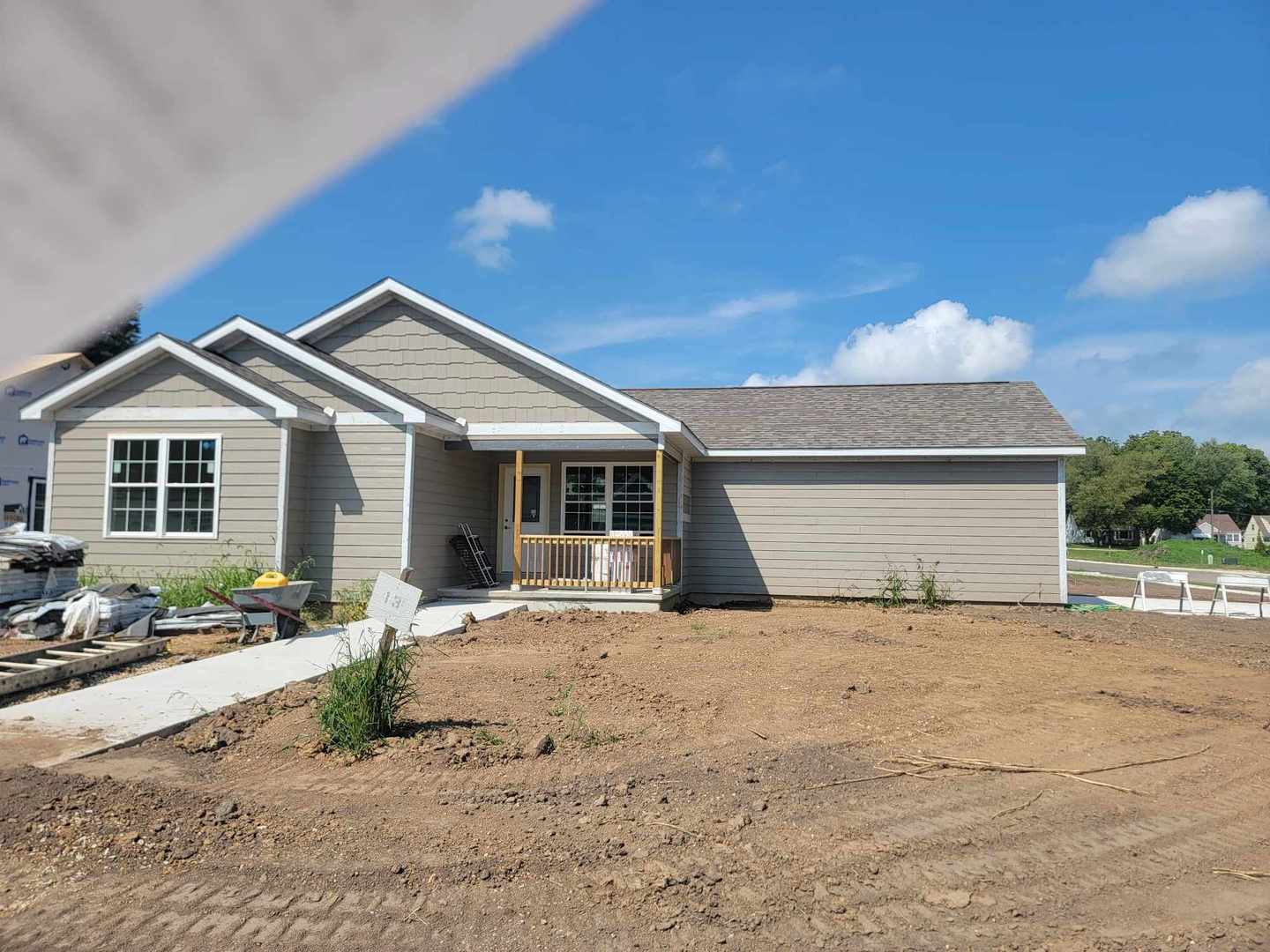 a front view of a house with a outdoor space