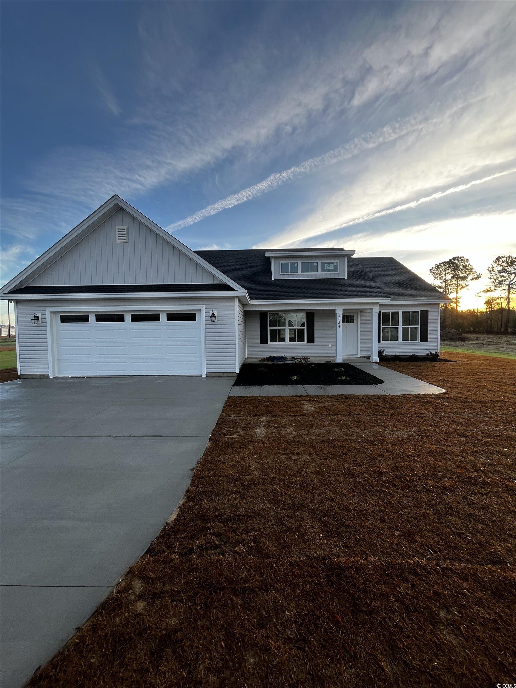 View of front facade with a garage