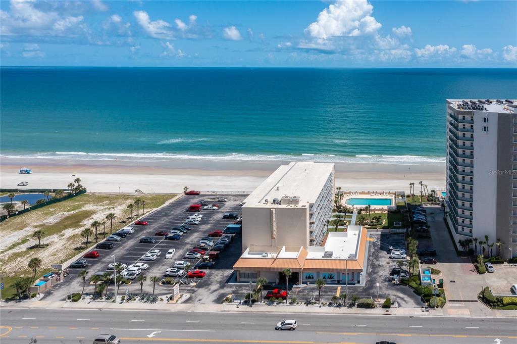 a view of a building with a ocean view