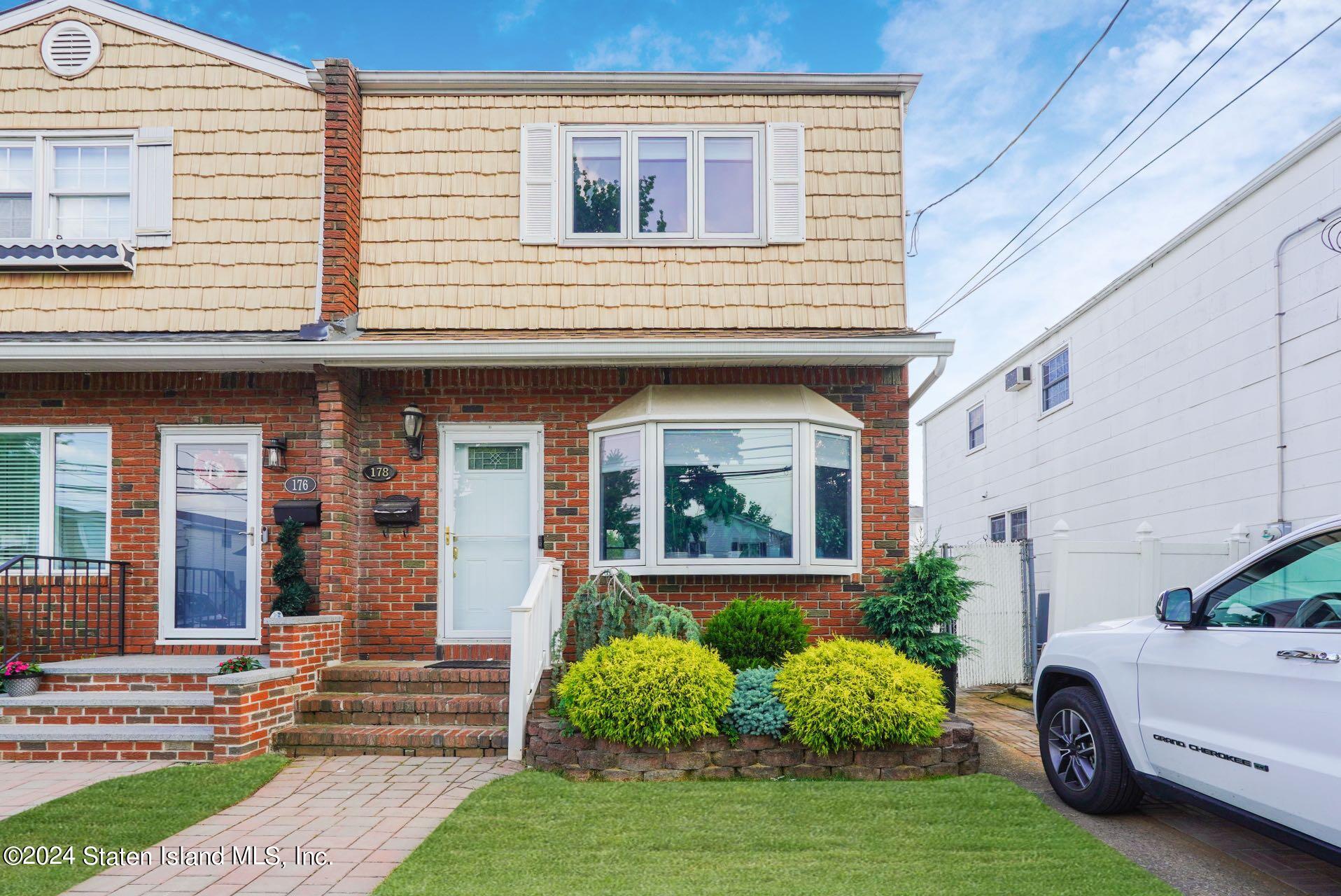 a house view with a garden space