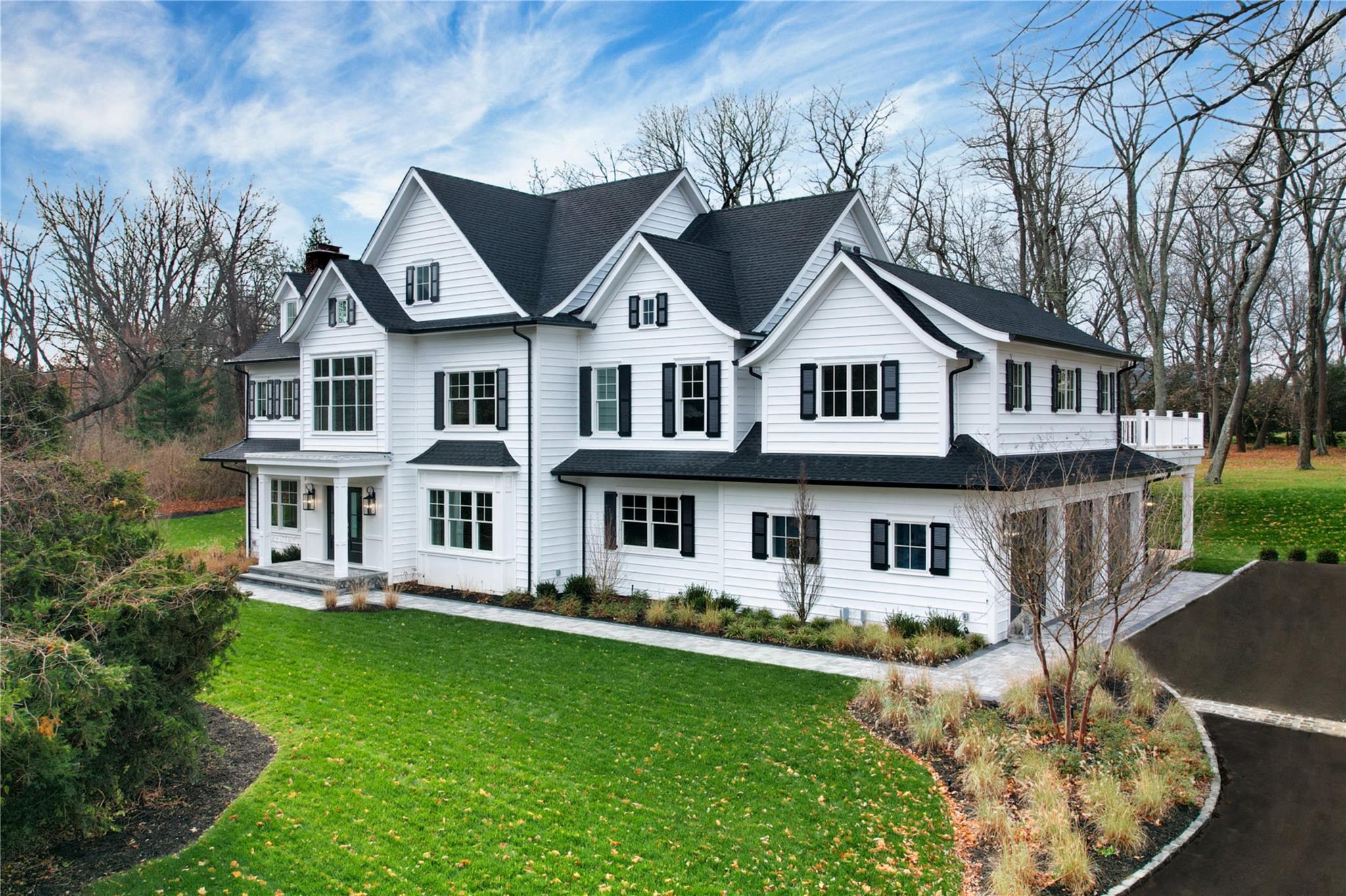 front view of a house with a yard