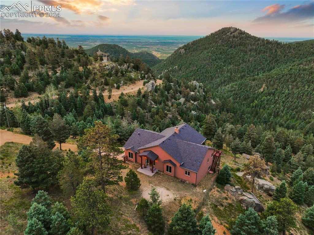 Exquisite custom rancher on a 0.60 acre lot in the Manitou Springs community of Crystal Park.