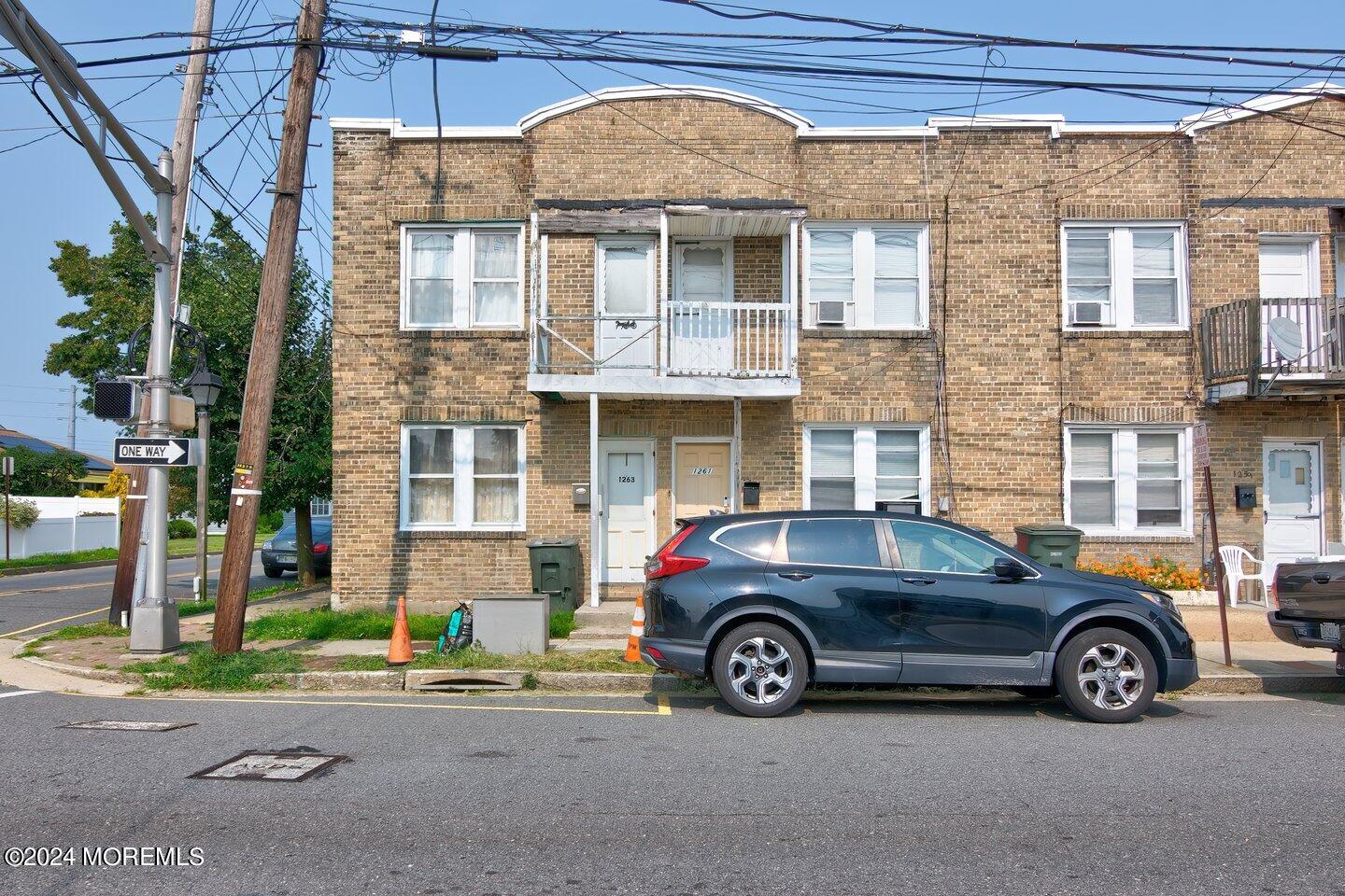 a car parked in front of a building