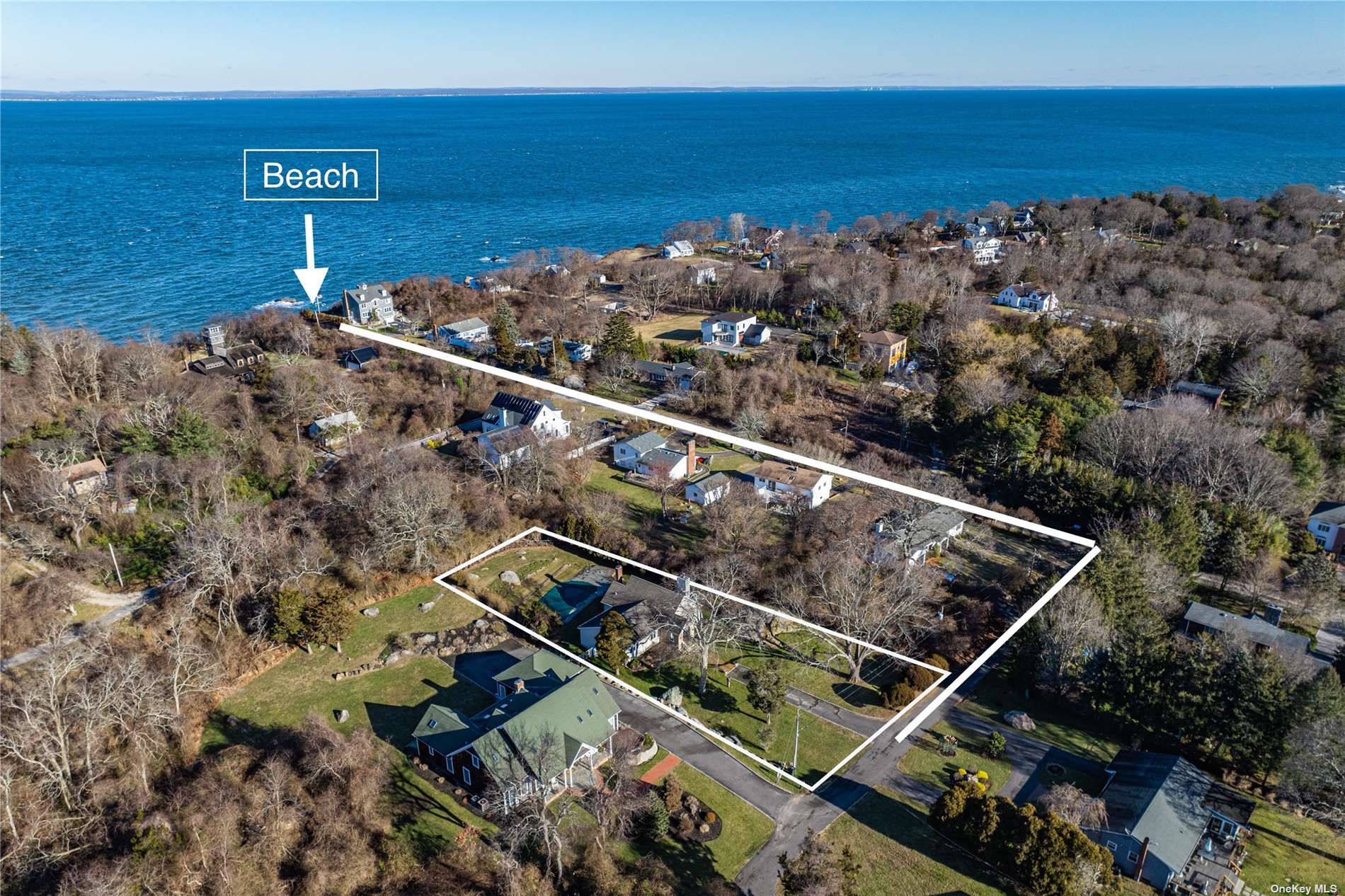 an aerial view of beach and ocean