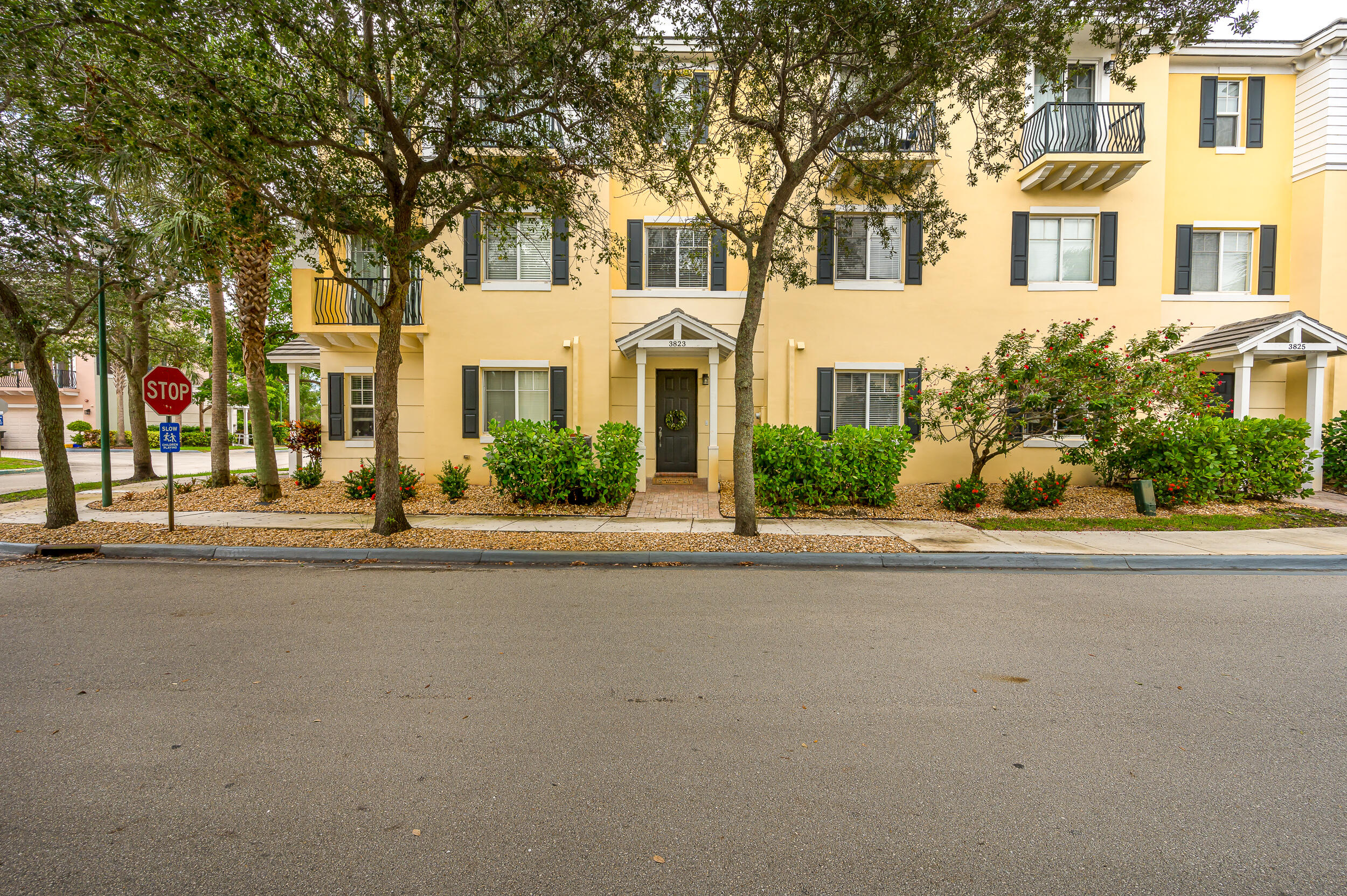 front view of a house with a street