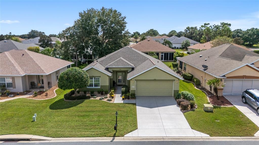 an aerial view of a house with garden