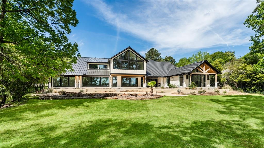 This magnificent farmhouse-style home is situated on a stunning 1.3-acre waterfront lot in the exclusive gated community of Ridgelake Shores. A total renovation by the renowned Framestead Builders has been recently completed. Prepare to be WOWed!