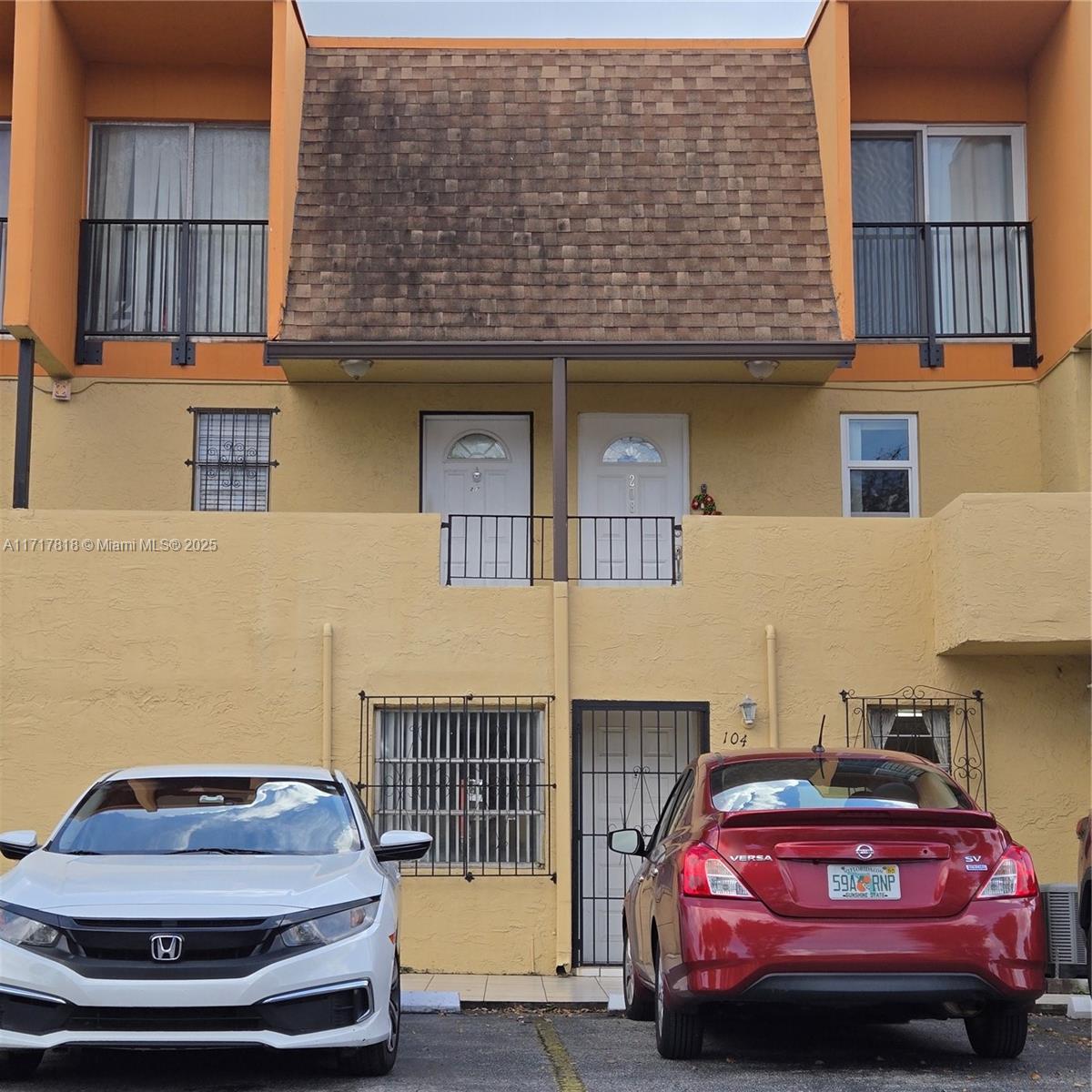 a car parked in front of a house