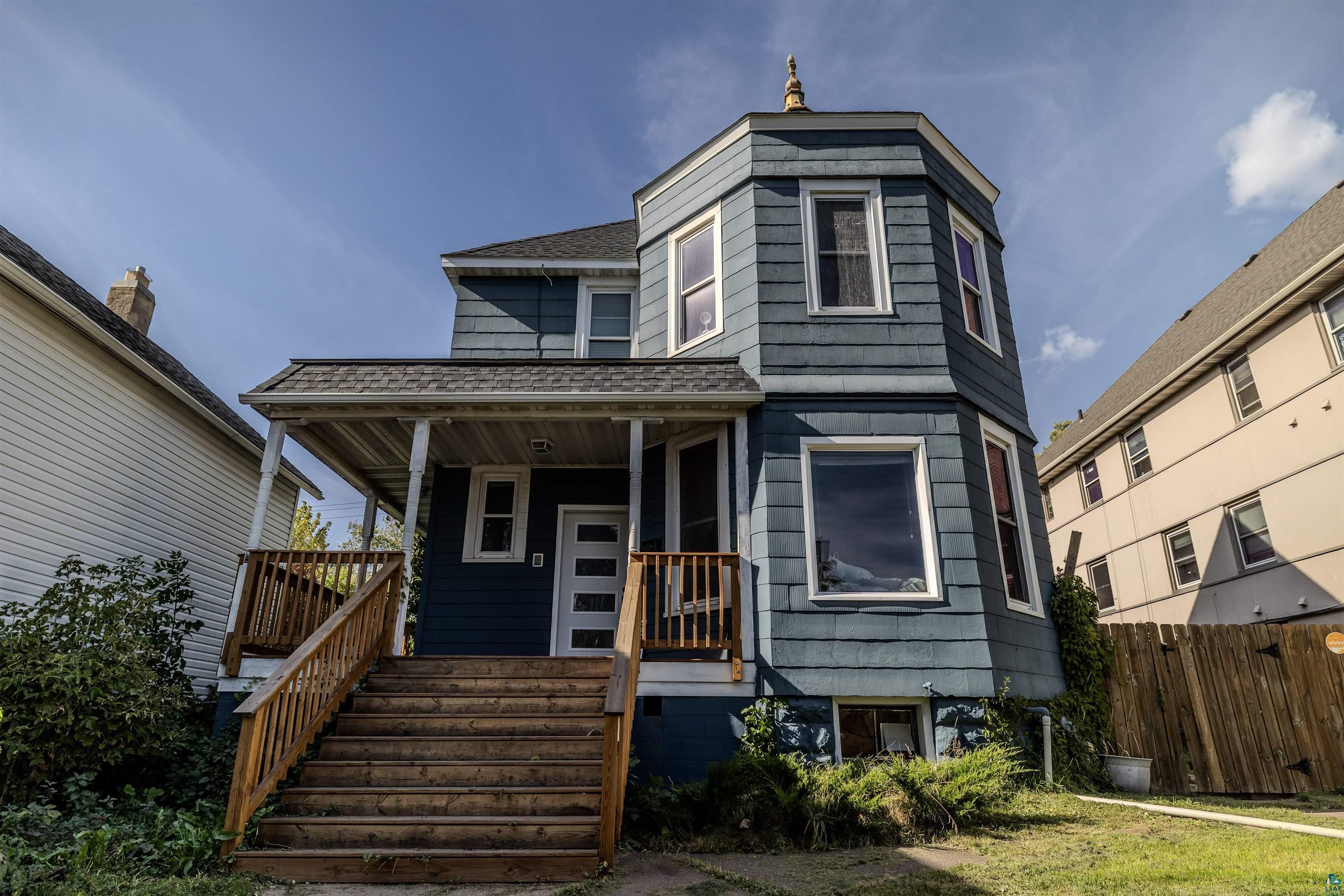 View of front of property featuring covered porch