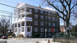 a front view of a building with street view