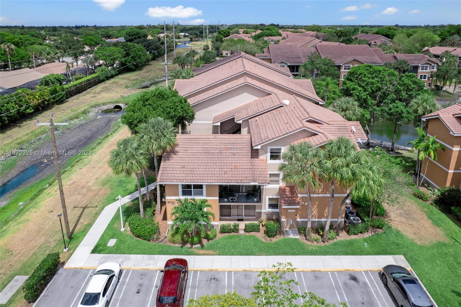 an aerial view of house with yard