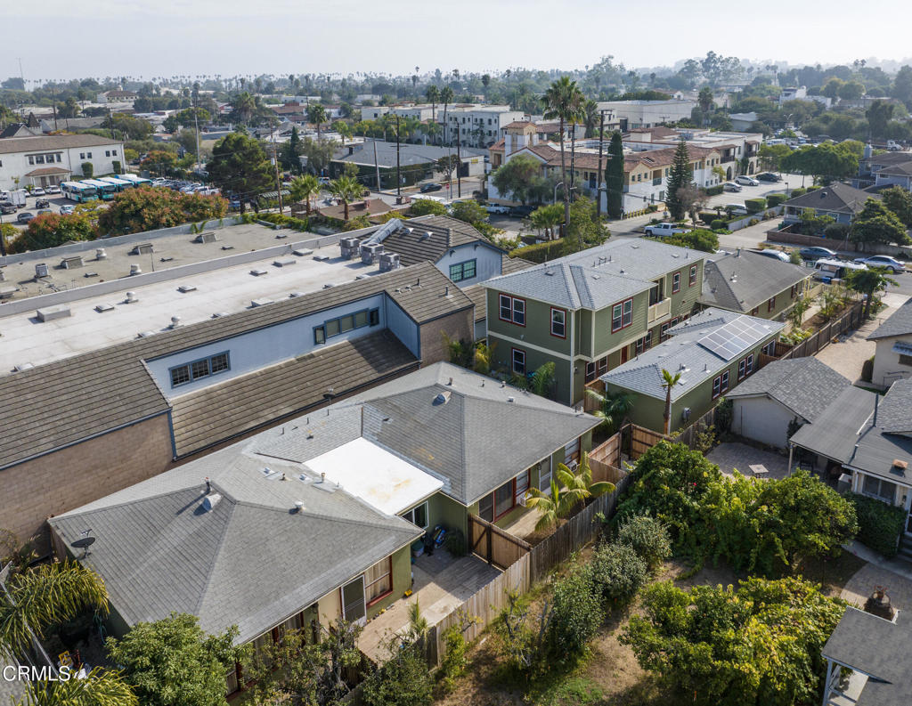 an aerial view of a house with a outdoor space