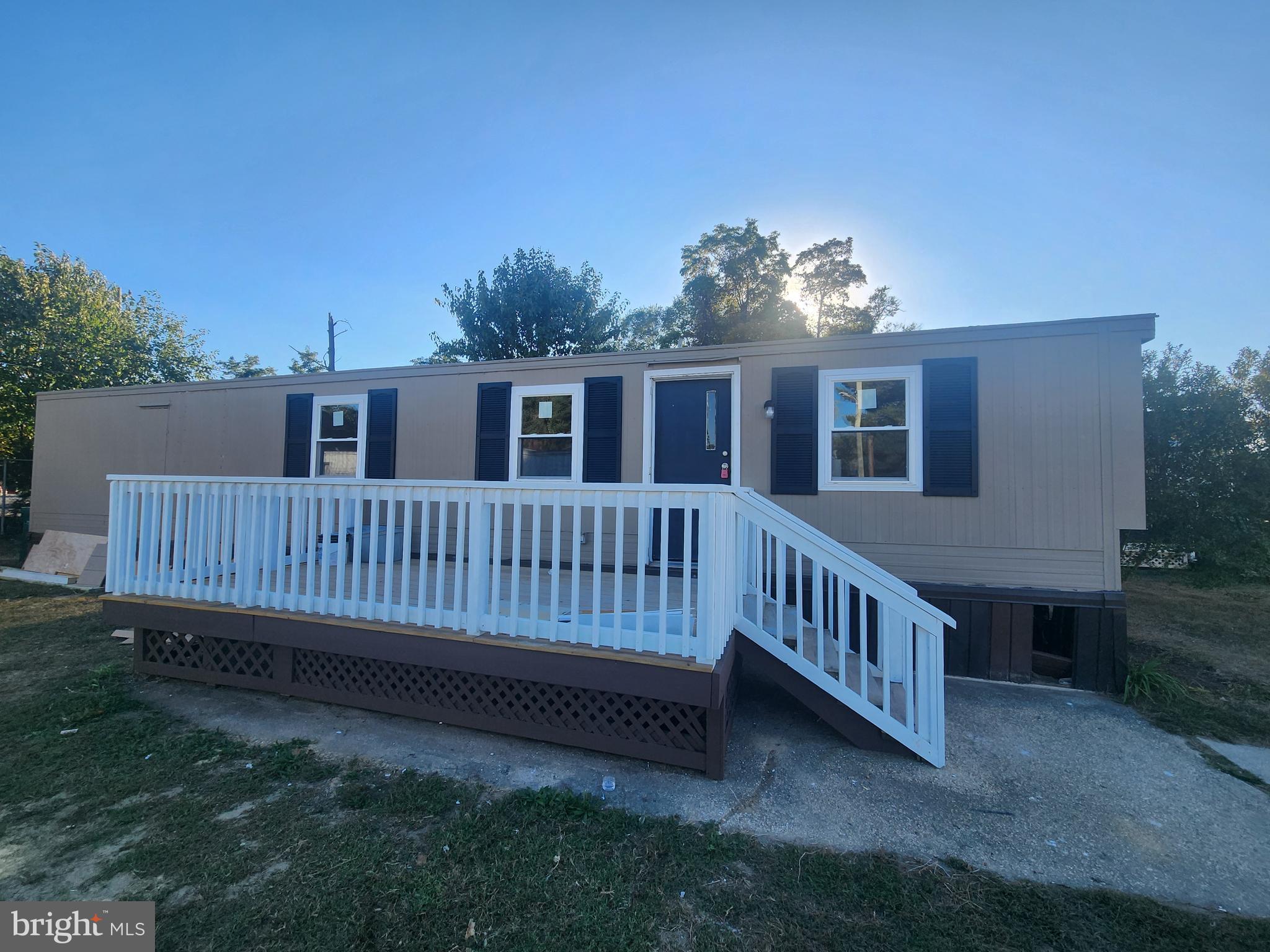 a view of a deck with a backyard