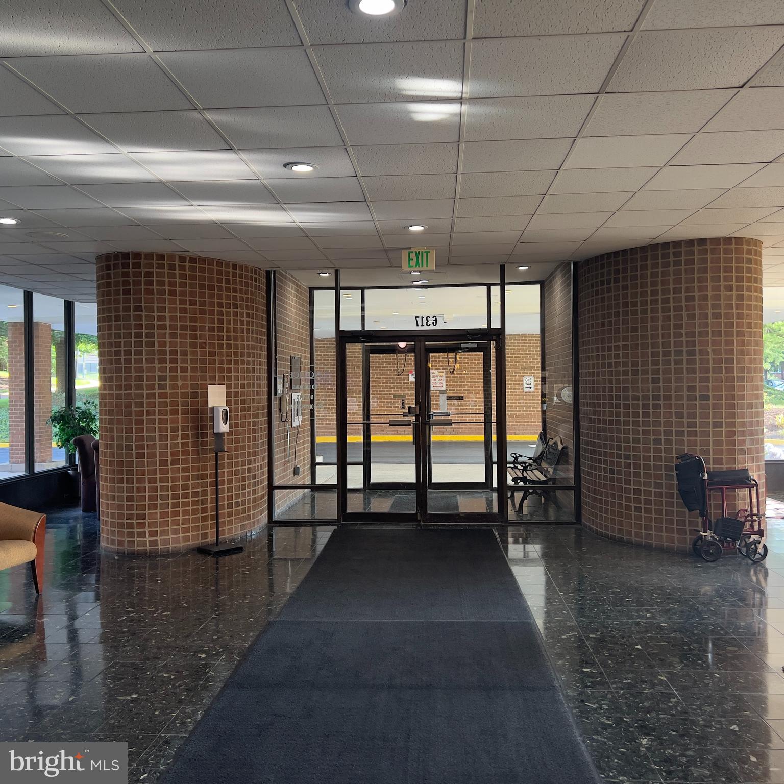 a view of empty room with windows