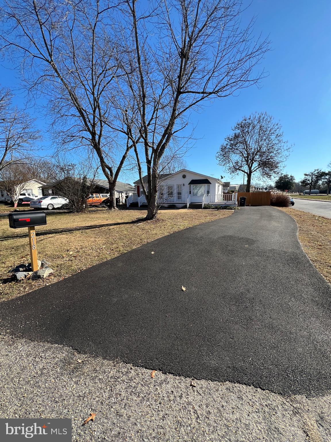 a view of a street with a house