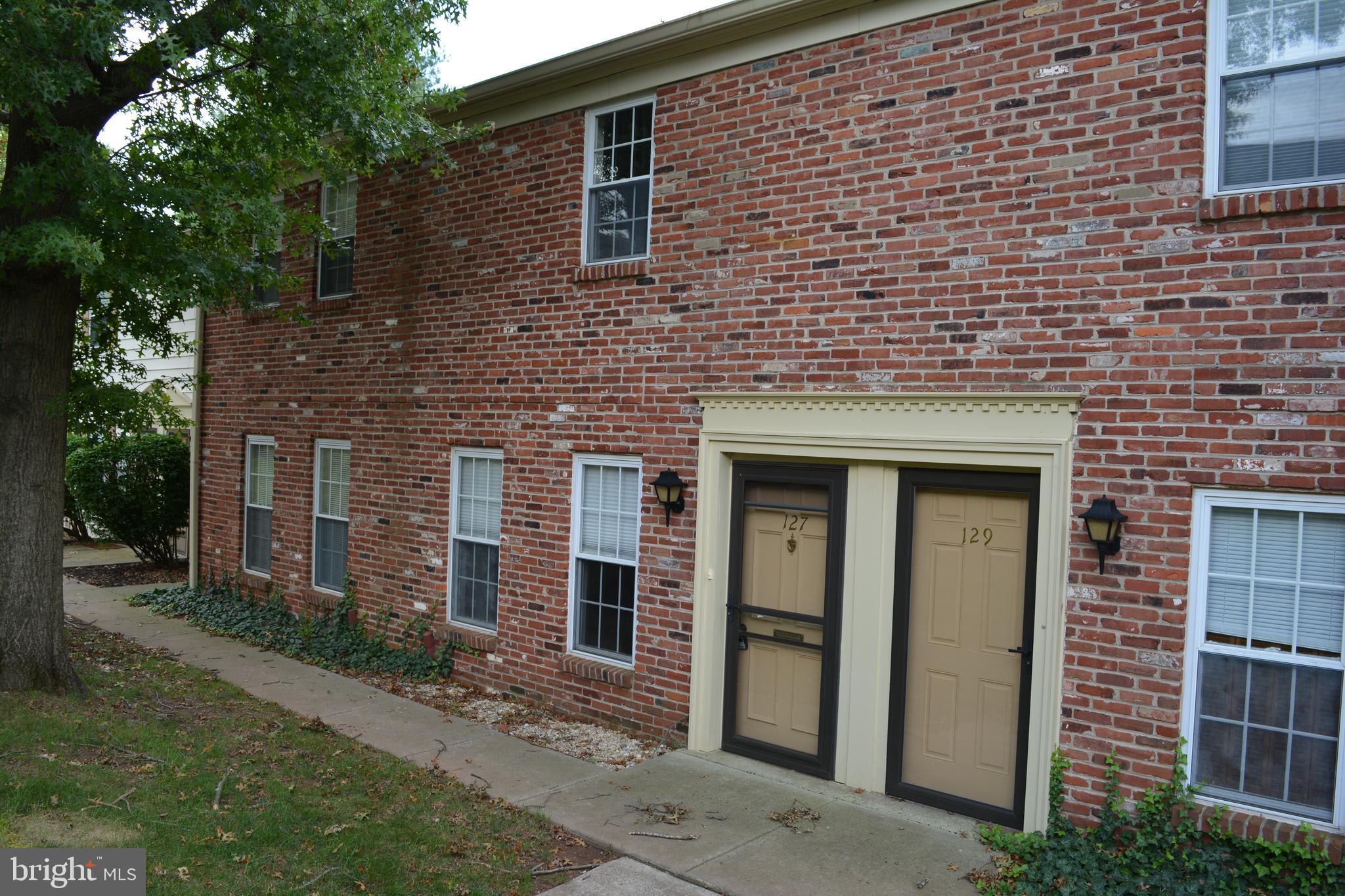 a brick building with a large windows