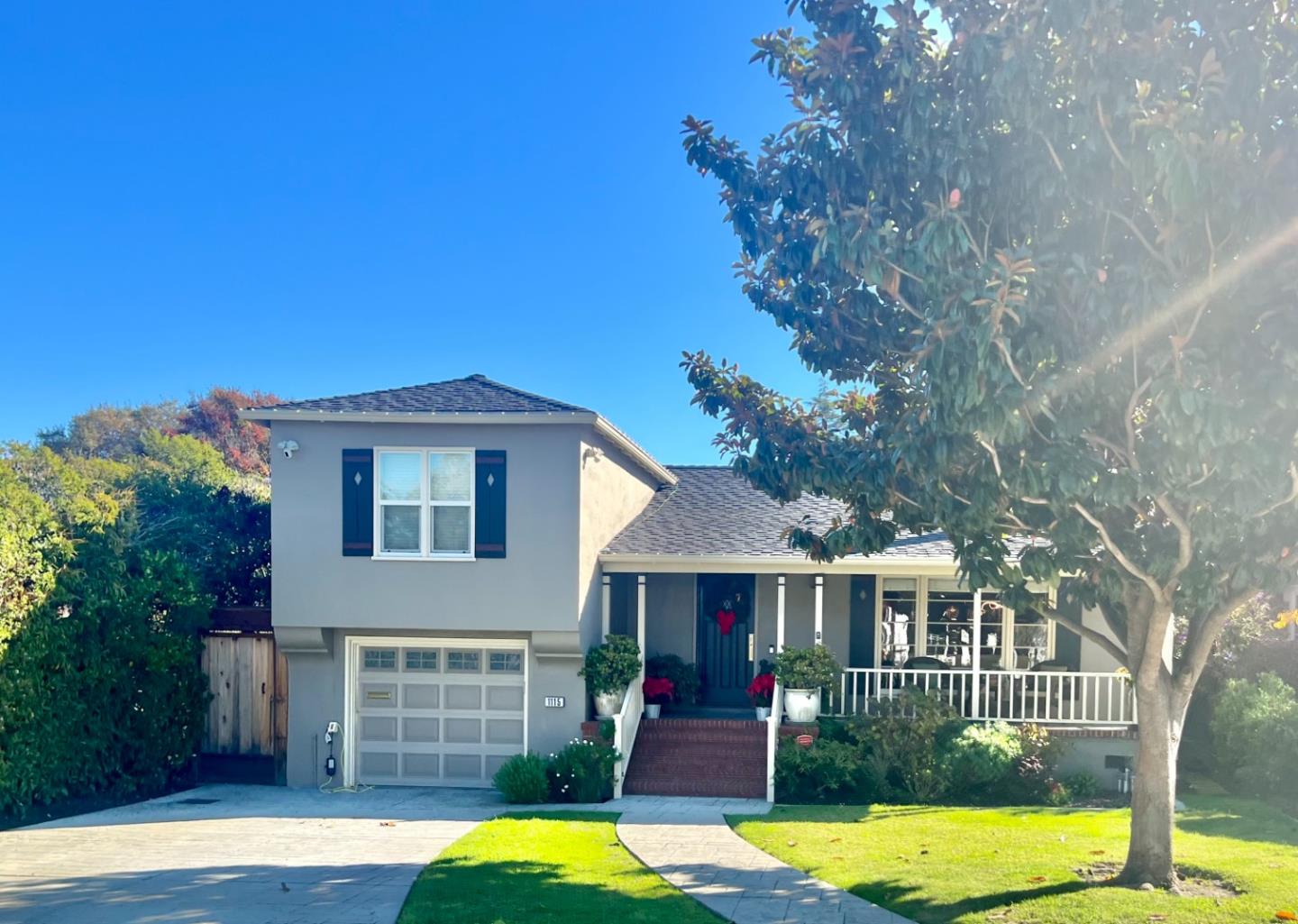 a front view of a house with a yard