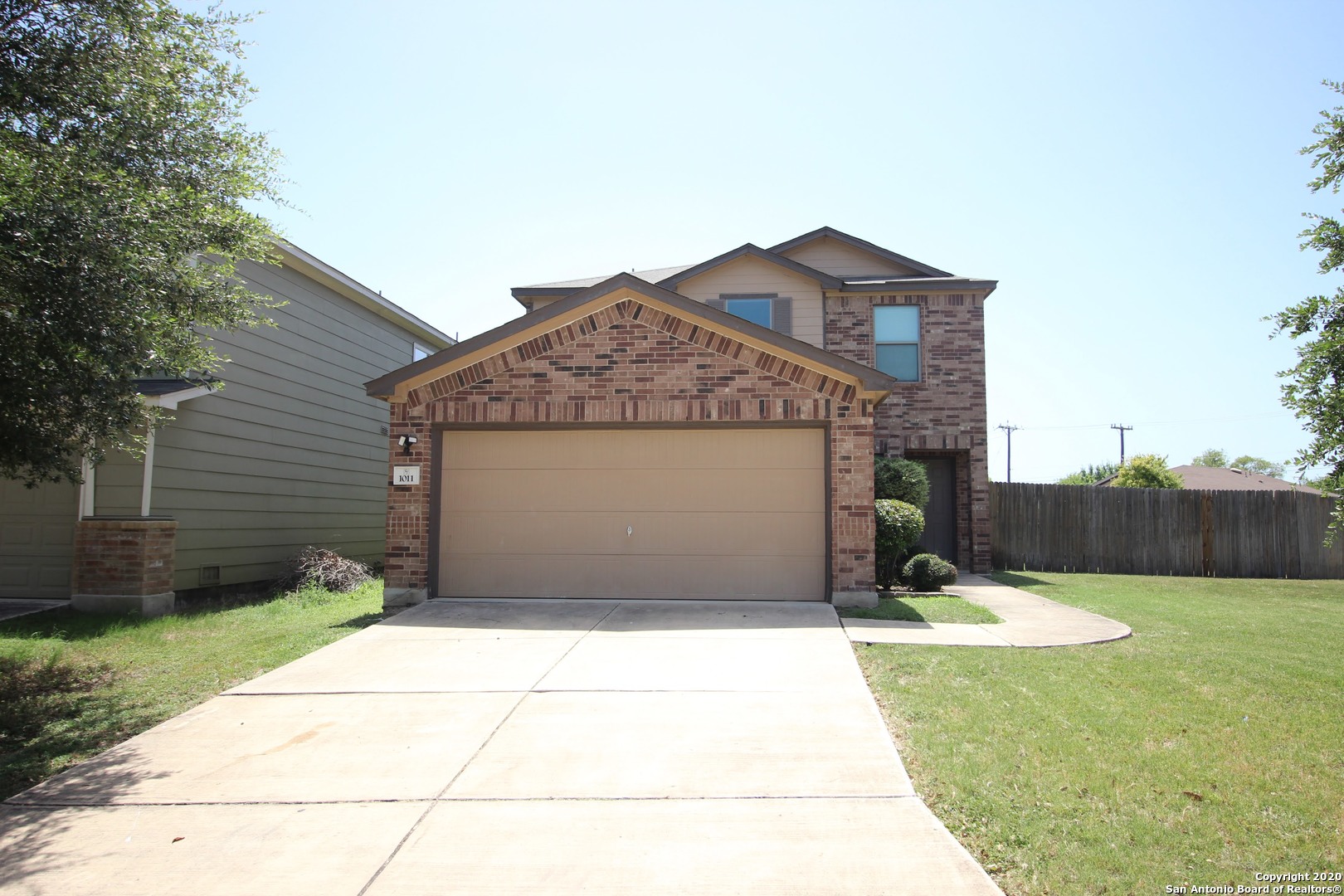 a front view of house with yard