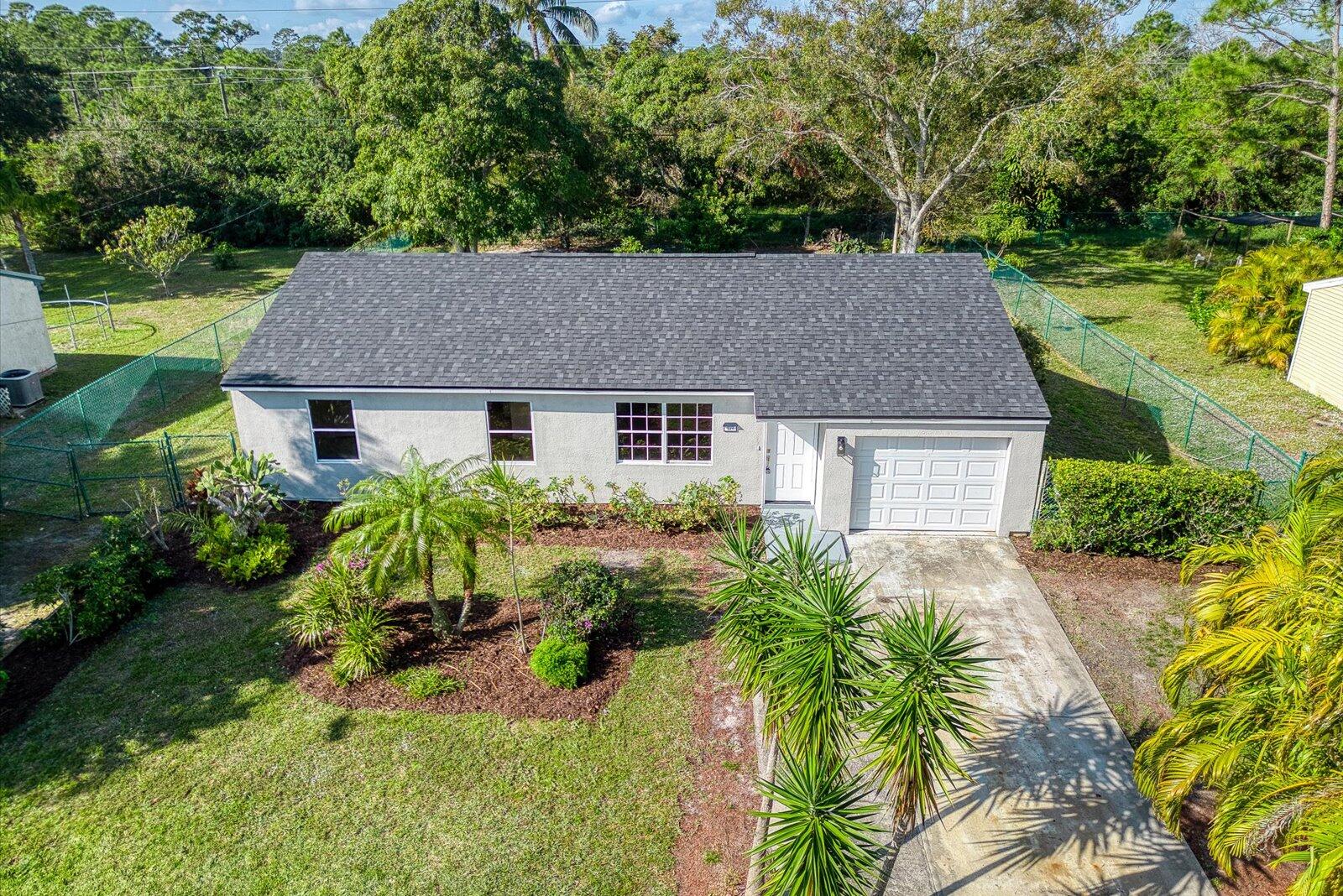 a house that has a lot of plants in it