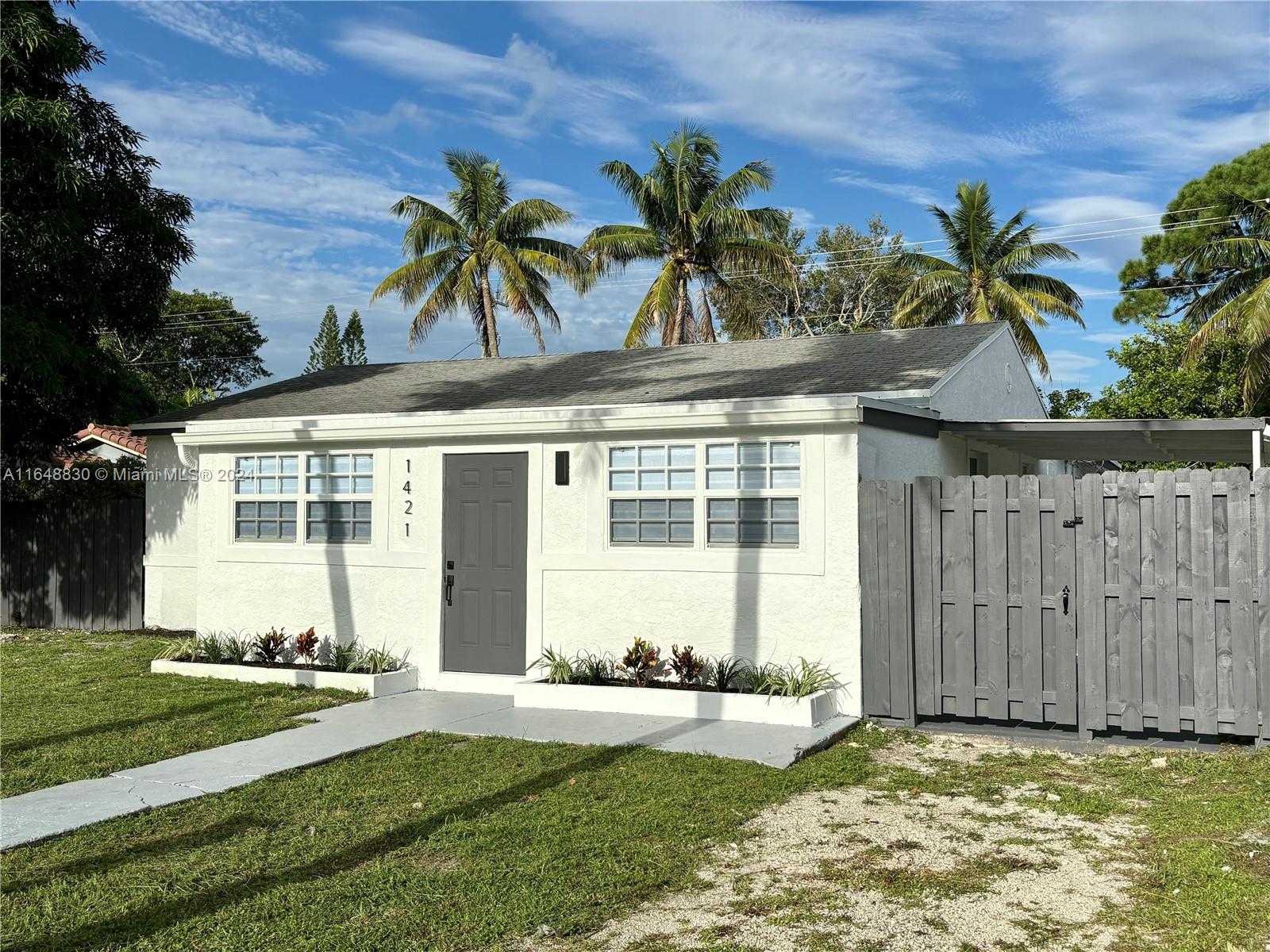 a front view of house with yard