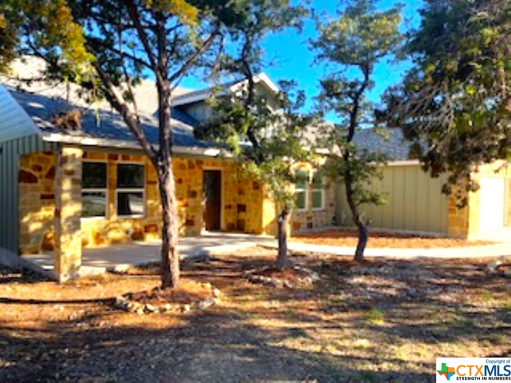 a view of a yard in front of a house