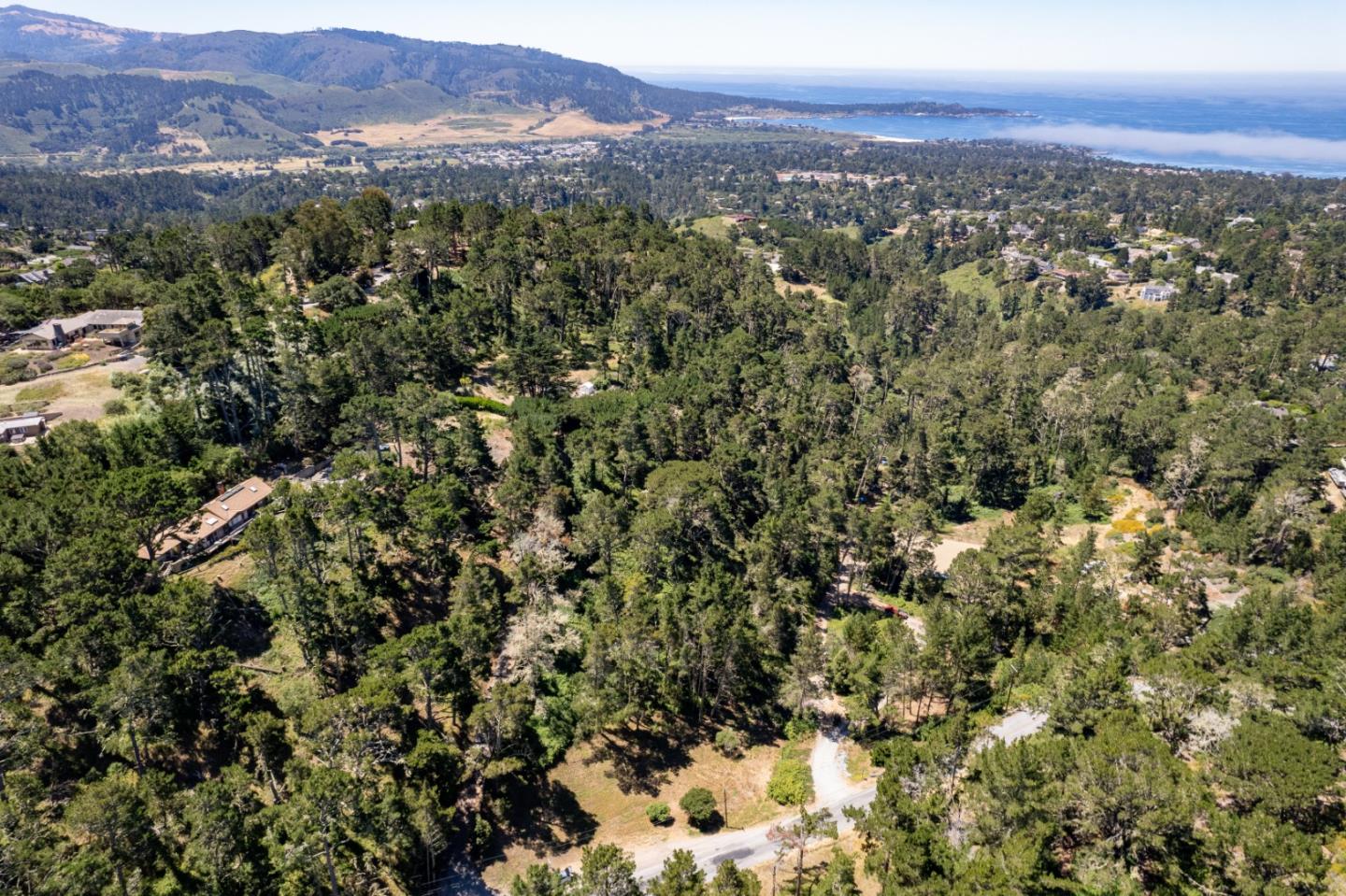 an aerial view of residential house and outdoor space