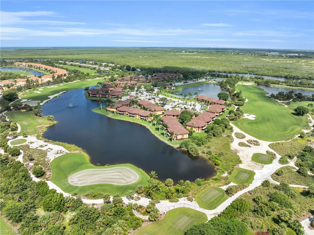 Bird's eye view with a water view and Hammock Bay Golf Course