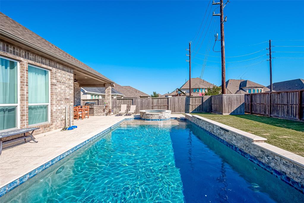 a view of a house with a swimming pool